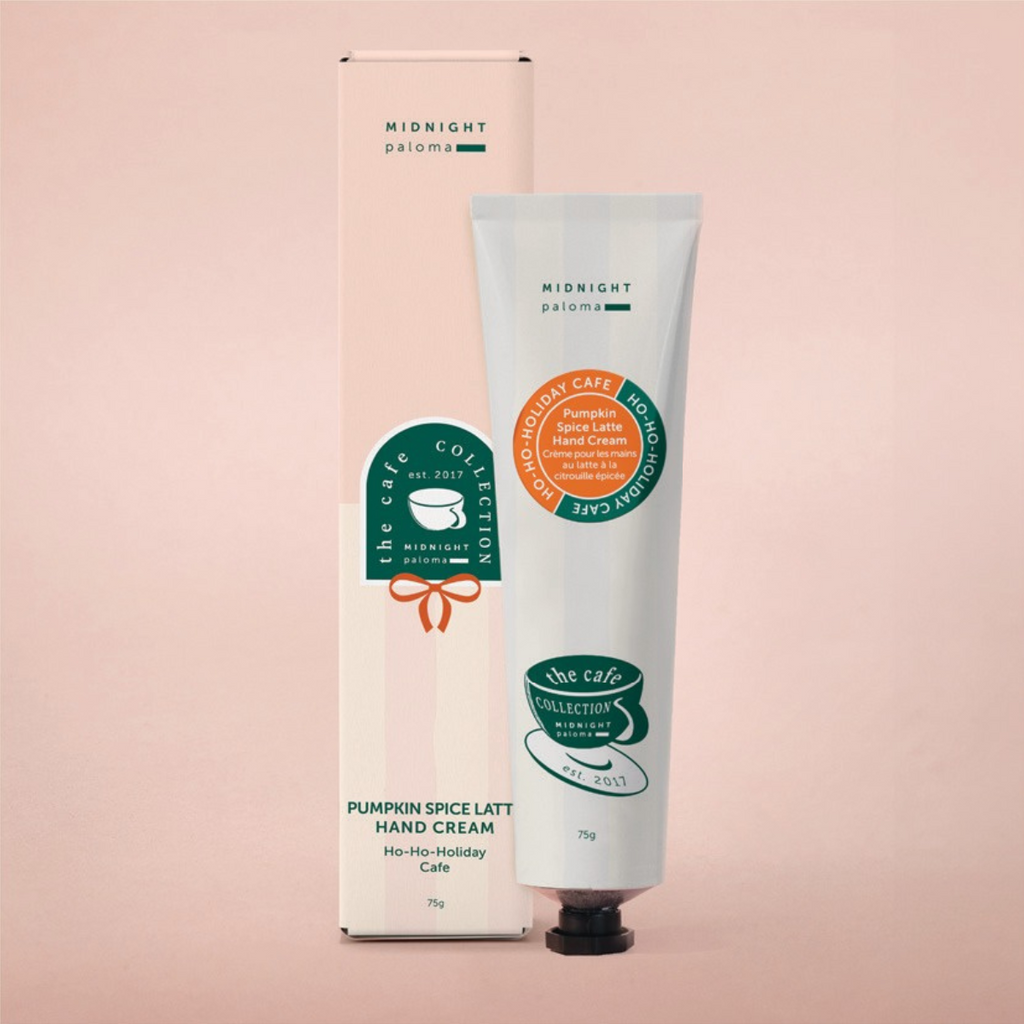 Tube of pumpkin spice latte hand cream with packaging on a pink background