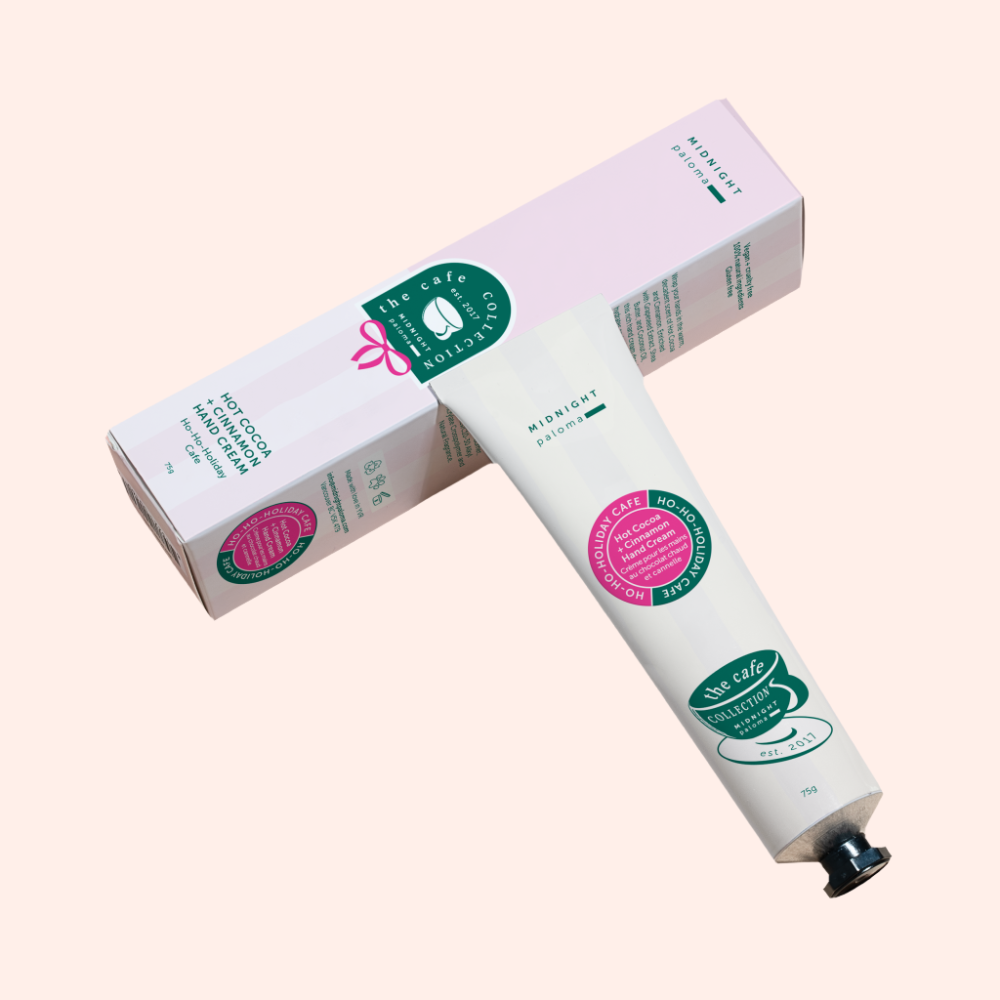 Hand cream tube and packaging on a beige background