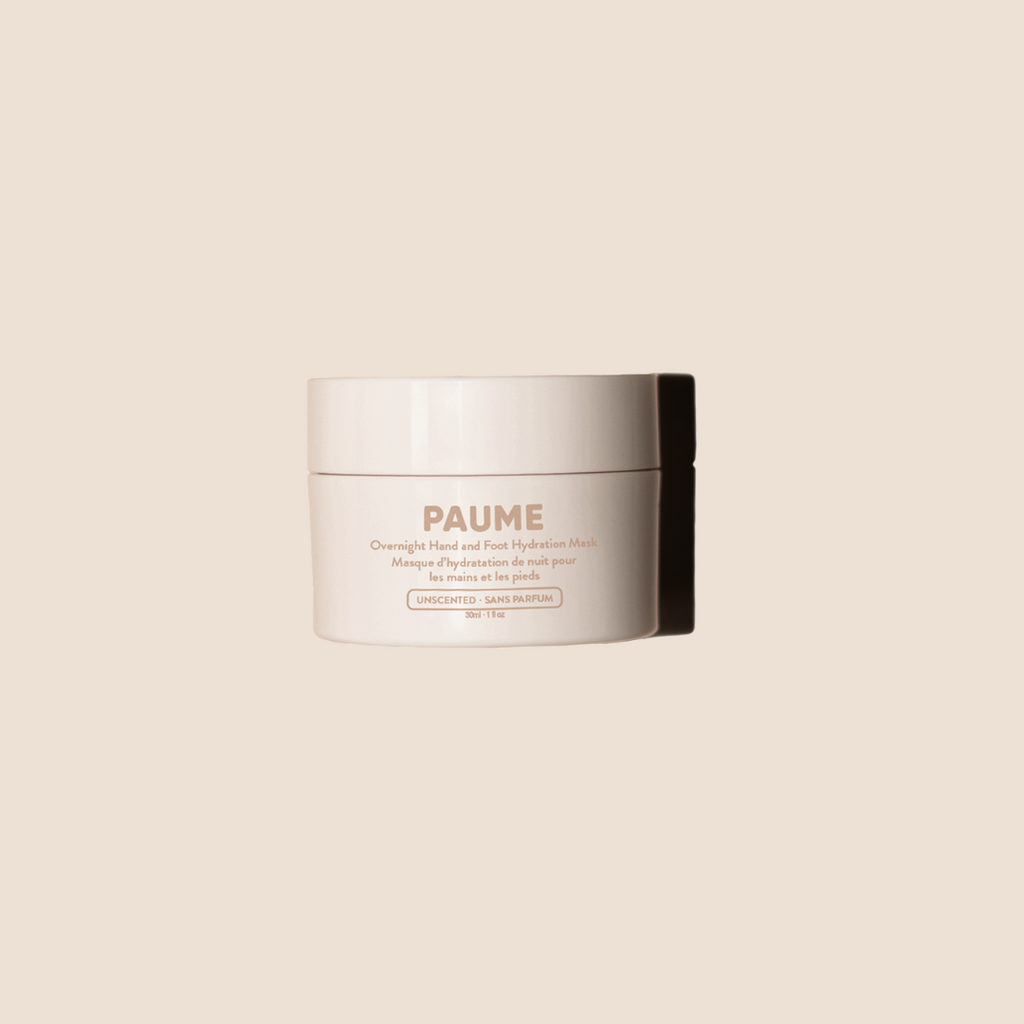 Jar of PAUME cream on a beige background