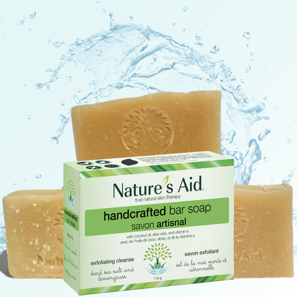 Nature's Aid handcrafted bar soap with packaging against a water splash background