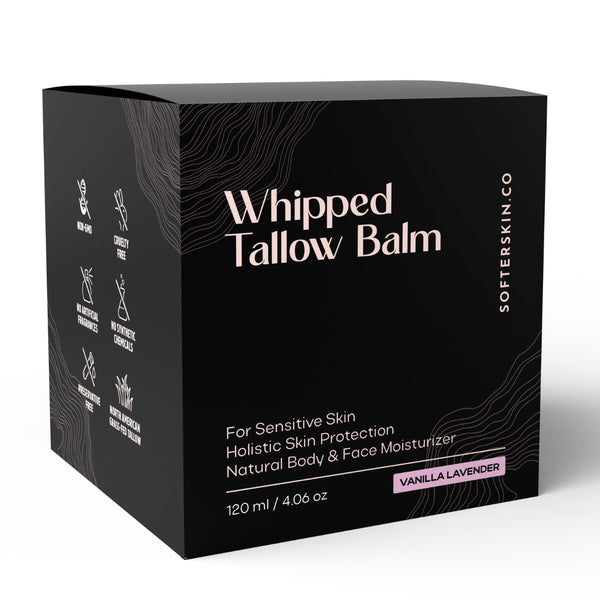 A black rectangular box of Whipped Tallow Balm by Softerskin Co, featuring white text and subtle line art, with a small lavender label indicating Vanilla Lavender scent.